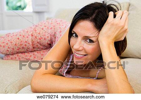 brunette, chilling out, calm, at-home View Large Photo Image Picture - brunette, chilling out, calm, at-home. Fotosearch