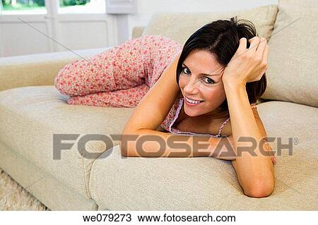 brunette, chilling out, calm, at-home View Large Photo Image Stock Image - brunette, chilling out, calm, at-home. Fotosearch