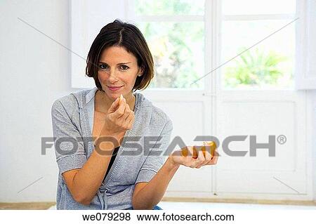 brunette, Citrus fruit, at-home View Large Photo Image Stock Photo - brunette, Citrus fruit, at-home. Fotosearch
