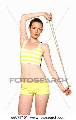 Stock Image - brunette, clipping path, Arms raised. Fotosearch