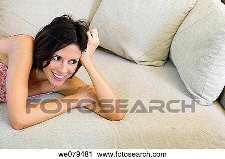 Stock Image - brunette, comfort, at-home. Fotosearch
