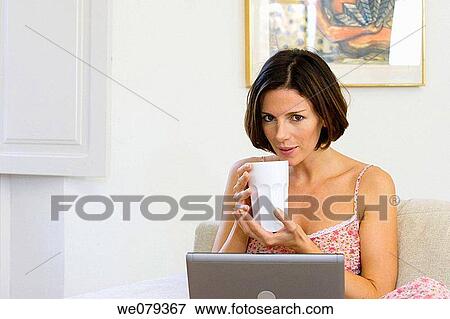 brunette, computer, at-home View Large Photo Image Stock Photo - brunette, computer, at-home. Fotosearch