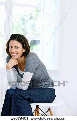 brunette, contemporary, at-home View Large Photo Image Stock Image - brunette, contemporary, at-home. Fotosearch