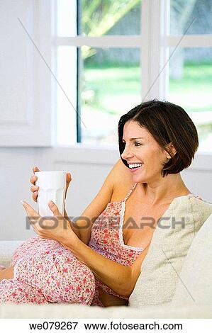 brunette, contemporary, at-home View Large Photo Image Stock Photo - brunette, contemporary, at-home. Fotosearch