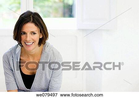 brunette, contemporary, at-home View Large Photo Image Stock Photo - brunette, contemporary, at-home. Fotosearch
