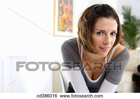 brunette, contemporary, at-home View Large Photo Image Stock Photograph - brunette, contemporary, at-home. Fotosearch