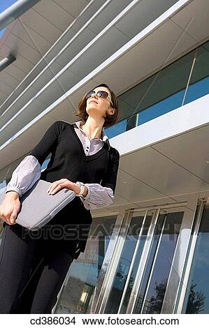 building, business, businesspeople, businesswoman, carry View Large Photo Image Picture - building, business, businesspeople, businesswoman, carry. Fotosearch