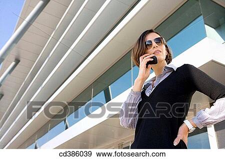 building, business, businesspeople, businesswoman, calling View Large Photo Image Stock Photo - building, business, businesspeople, businesswoman, calling. Fotosearch