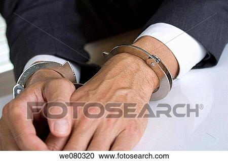 Stock Image - business, catch, businesspeople, businessman, arrest. Fotosearch