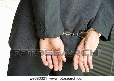 Stock Image - business, catch, businesspeople, businessman, arrest. Fotosearch
