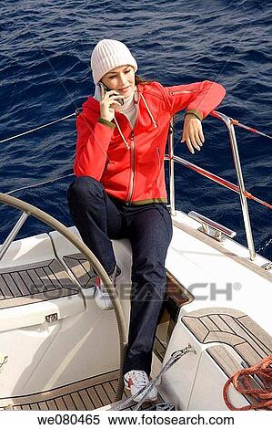 calling, cap, cell phone View Large Photo Image Stock Photography - calling, cap, cell phone. Fotosearch