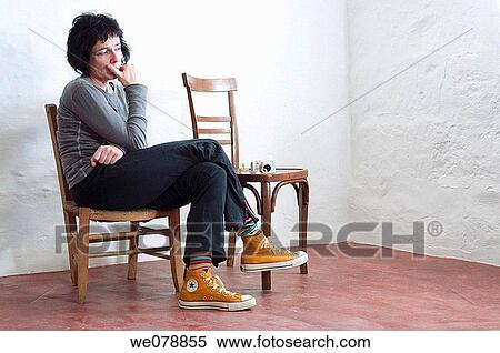 camera, chair, absorbed View Large Photo Image Stock Photography - camera, chair, absorbed. Fotosearch