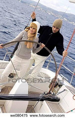 Stock Photography - cap, contemporary, couple. Fotosearch