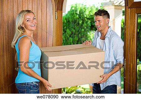 Stock Image - cardboard, carrying, carry, at-home. Fotosearch