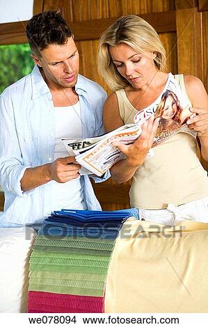 catalogue, choosing, choice, at-home View Large Photo Image Picture - catalogue, choosing, choice, at-home. Fotosearch
