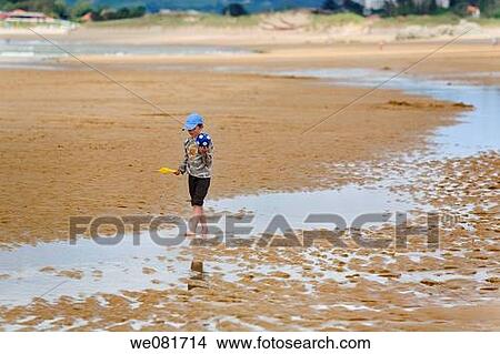 Children playing on a beach View Large Photo Image Picture - Children playing on a beach. Fotosearch