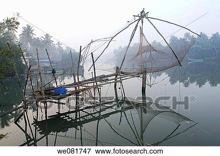 Chinese fishing net, backwater of Cherai, Kerala, India View Large Photo Image Stock Photo - Chinese fishing net, backwater of Cherai, Kerala, India. Fotosearch