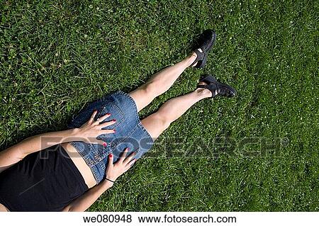 Close-up of a young woman's lower body. View Large Photo Image Stock Photo - Close-up of a young woman's lower body.. Fotosearch