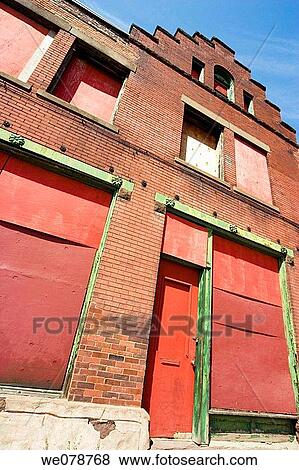 Stock Photo - Exterior of an abandoned city building.. Fotosearch