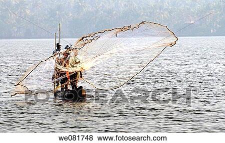Fishing in backwaters of Kerala, India View Large Photo Image Stock Photo - Fishing in backwaters of Kerala, India. Fotosearch