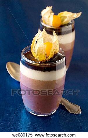 Four chocolates dessert with Cape gooseberry fruits View Large Photo Image Stock Photography - Four chocolates dessert with Cape gooseberry fruits. Fotosearch