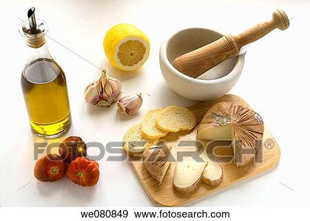 Goat's milk cheese, tomatoes? Raf?, lemon, olive oil, bread and garlic View Large Photo Image Stock Photo - Goat's milk cheese, tomatoes? Raf?, lemon, olive oil, bread and garlic. Fotosearch