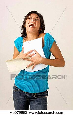 Latin model in his 30s celebrating the arrival of a letter View Large Photo Image Stock Image - Latin model in his 30s celebrating the arrival of a letter. Fotosearch