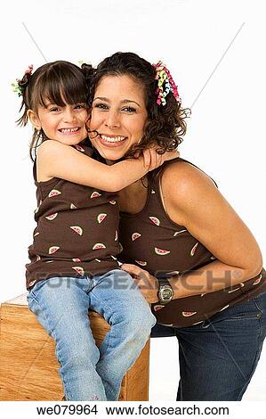 Latin pregnant woman and child posing in the studio View Large Photo Image Picture - Latin pregnant woman and child posing in the studio. Fotosearch