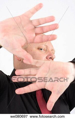Middle-age man covering his face View Large Photo Image Stock Photo - Middle-age man covering his face. Fotosearch