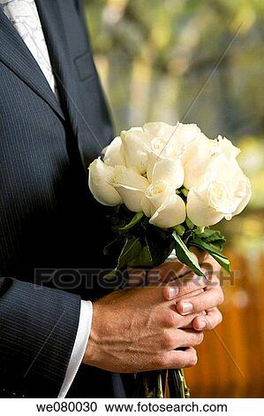 Newlywed holding bouquet View Large Photo Image Stock Image - Newlywed holding bouquet. Fotosearch