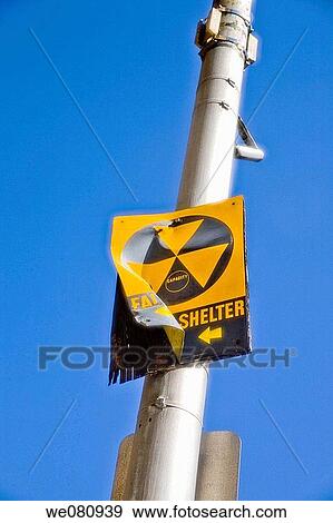 Old and bent? Fallout Shelter? sign on a metal pole. View Large Photo Image Stock Photo - Old and bent? Fallout Shelter? sign on a metal pole.. Fotosearch