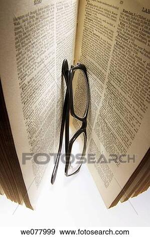 Old Book with Eyeglasses View Large Photo Image Stock Photo - Old Book with Eyeglasses. Fotosearch