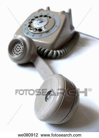 Old Grey telephone with hand set in place and old fashioned dial Communications dial of old Bakelite Telephone Pune, Maharashtra, India View Large Photo Image Stock Image - Old Grey telephone with hand set in place and old fashioned dial Communications dial of old Bakelite Telephone Pune, Maharashtra, India. Fotosearch