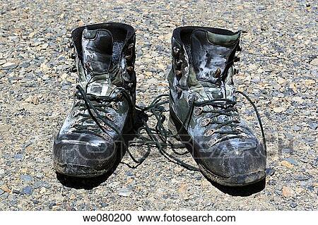 pair of old and worn hiking boots, full of salt stains, California, USA View Large Photo Image Stock Image - pair of old and worn hiking boots, full of salt stains, California, USA. Fotosearch