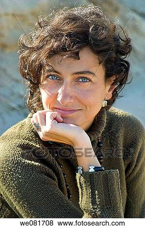Portrait of a young woman with blue eyes View Large Photo Image Stock Photo - Portrait of a young woman with blue eyes. Fotosearch