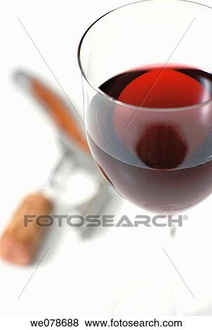 Red wine, focus on glass View Large Photo Image Stock Photo - Red wine, focus on glass. Fotosearch
