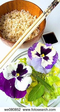 Salad with pansies, white rice and soy sauce View Large Photo Image Stock Image - Salad with pansies, white rice and soy sauce. Fotosearch