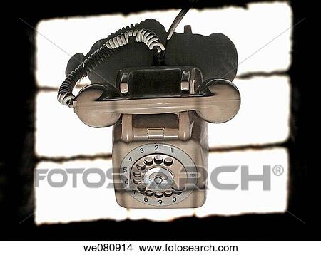 Top view of an Old Grey telephone with hand set in place and old fashioned dial Communications dial of old Bakelite Telephone Pune, Maharashtra, India View Large Photo Image Picture - Top view of an Old Grey telephone with hand set in place and old fashioned dial Communications dial of old Bakelite Telephone Pune, Maharashtra, India. Fotosearch