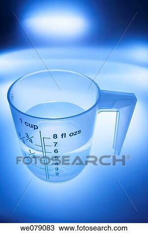 Water in Plastic Measuring Cup View Large Photo Image Stock Image - Water in Plastic Measuring Cup. Fotosearch