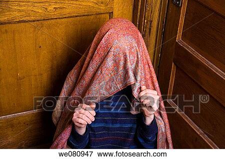 Young woman with a scarf covering her head. View Large Photo Image Stock Photo - Young woman with a scarf covering her head.. Fotosearch