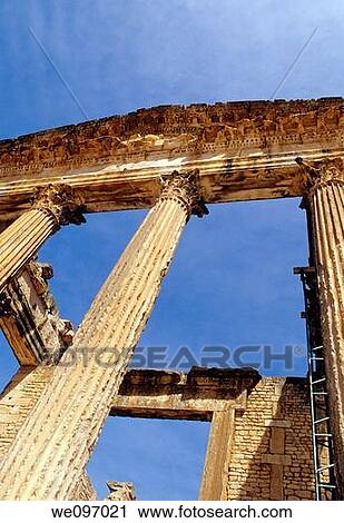 Stock Image - 10m high walls of the 2nd century Capitol at the Roman ruins in the Kalled Valley- Dougga, Tunisia. Fotosearch