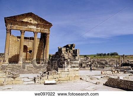 Stock Image - 10m high walls of the 2nd century Capitol at the Roman ruins in the Kalled Valley- Dougga, Tunisia. Fotosearch