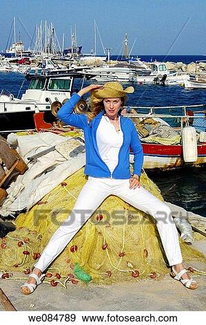30 year old woman at port, Paros, Cyclades islands, Greece View Large Photo Image Stock Photo - 30 year old woman at port, Paros, Cyclades islands, Greece. Fotosearch