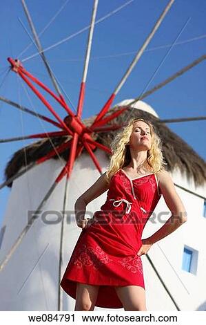 30 year old woman in front of windmill, Mykonos, Cyclades islands, Greece View Large Photo Image Stock Image - 30 year old woman in front of windmill, Mykonos, Cyclades islands, Greece. Fotosearch