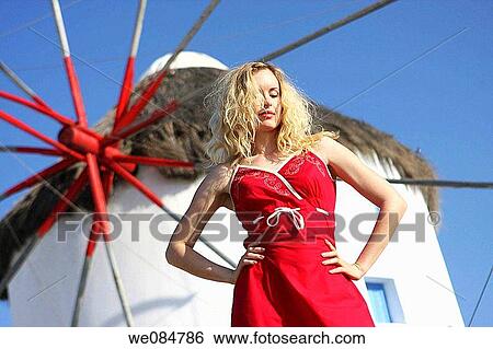 30 year old woman in front of windmill, Mykonos, Cyclades islands, Greece View Large Photo Image Stock Photograph - 30 year old woman in front of windmill, Mykonos, Cyclades islands, Greece. Fotosearch