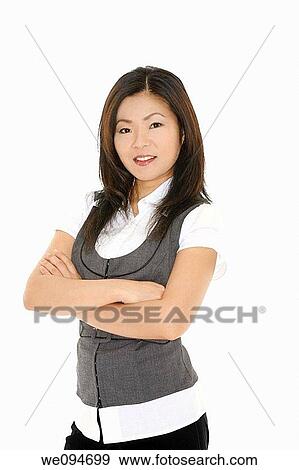A beautiful and confident Asian businesswoman on white background View Large Photo Image Stock Photo - A beautiful and confident Asian businesswoman on white background. Fotosearch