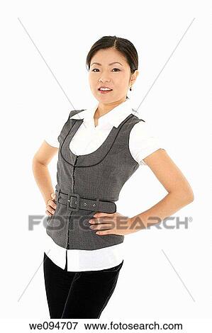 A beautiful and confident Asian businesswoman on white background View Large Photo Image Stock Photo - A beautiful and confident Asian businesswoman on white background. Fotosearch