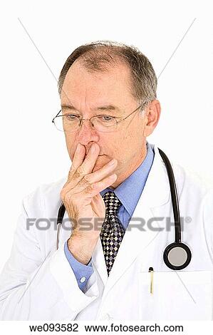 A caucasian doctor with a receding hairline wearing a white lab coat He is shown on a white background with with a worried look on his face View Large Photo Image Stock Image - A caucasian doctor with a receding hairline wearing a white lab coat He is shown on a white background with with a worried look on his face. Fotosearch