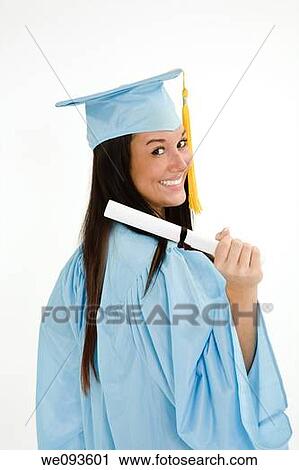 A female caucasian in blue graduation gown and very excited She is on a white background View Large Photo Image Stock Image - A female caucasian in blue graduation gown and very excited She is on a white background. Fotosearch