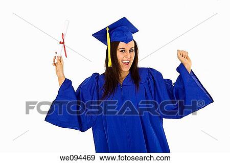Stock Photo - A female caucasian in blue graduation gown and very excited She is on a white background. Fotosearch